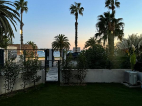 T3 NEUF AVEC TERRASSE ET JARDIN FACE a LA MER